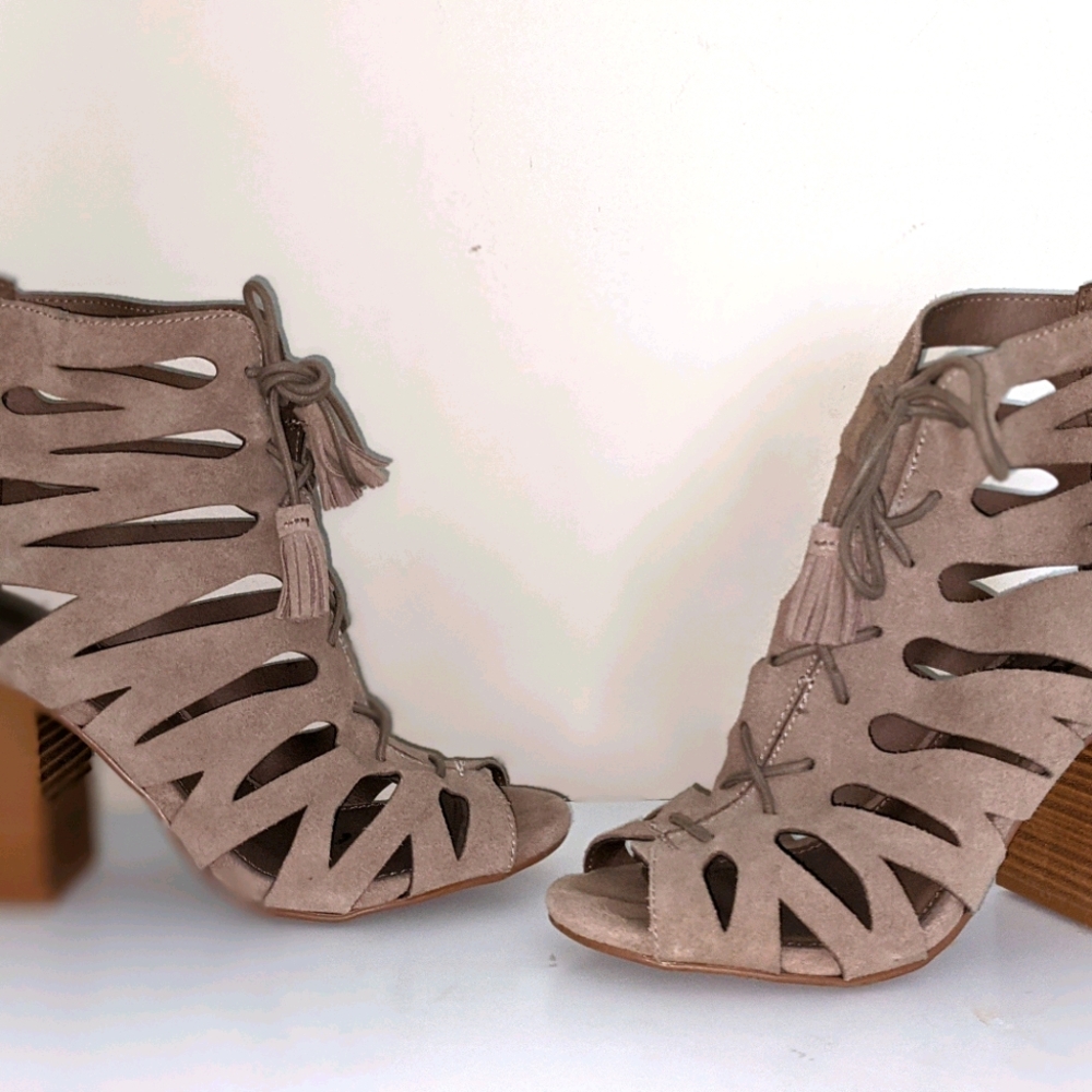 Women laced up tassel booties